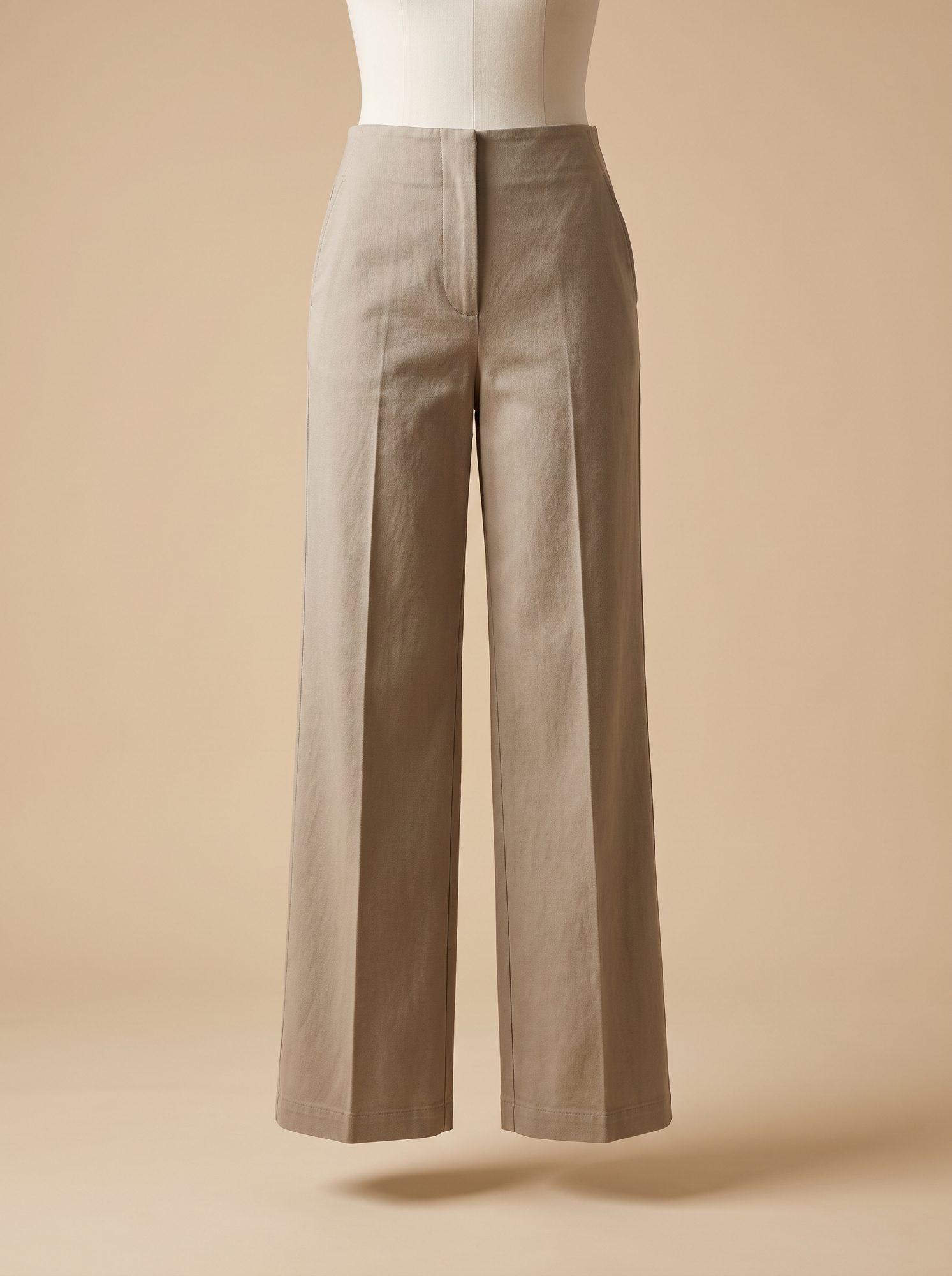 Stone cotton twill wide-leg trouser with a pressed front crease on a stand